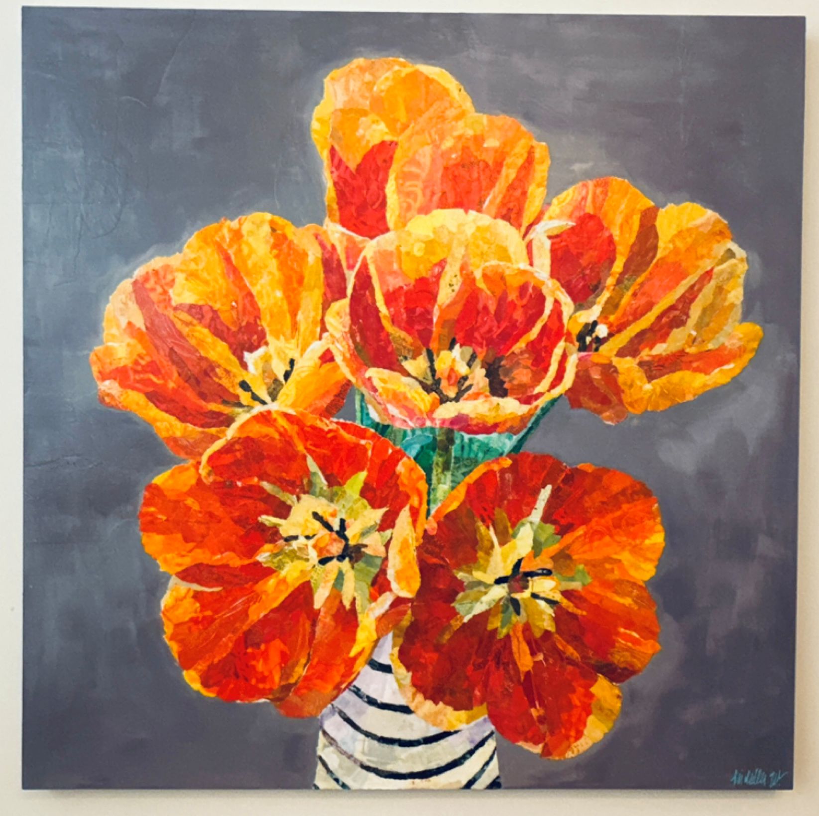 Mixed media floral art by Michelle Werl featuring orange, red and yellow tulips in a striped vase